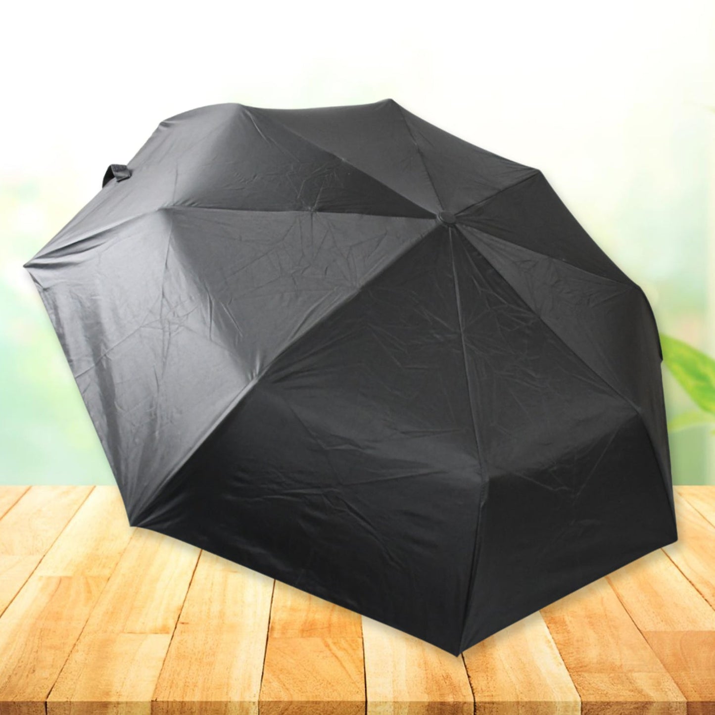 Compact Black windproof 2-fold umbrella, sunproof and rainproof, with a sturdy steel shaft and wrist strap. Lightweight and easy to carry