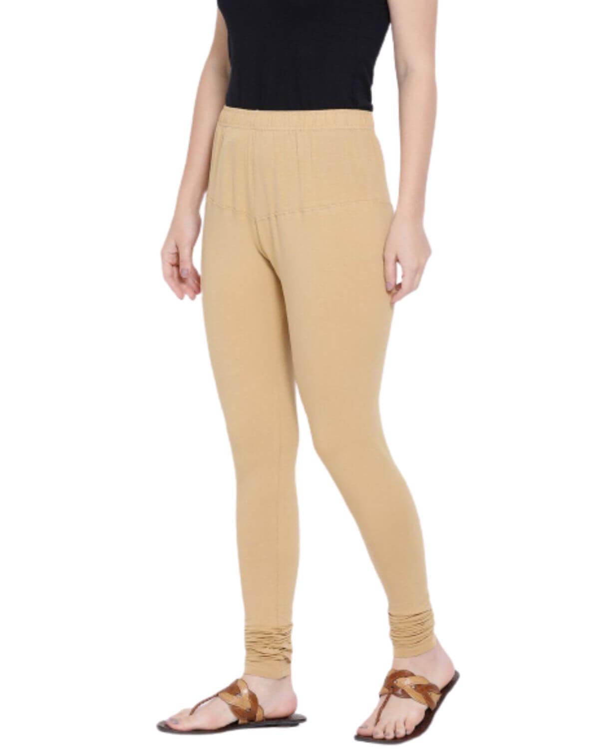 3 pack of stretchable churidar length leggings in black, white, and beige. Made from cotton lycra blend. Free size. Versatile women's fashion essentials