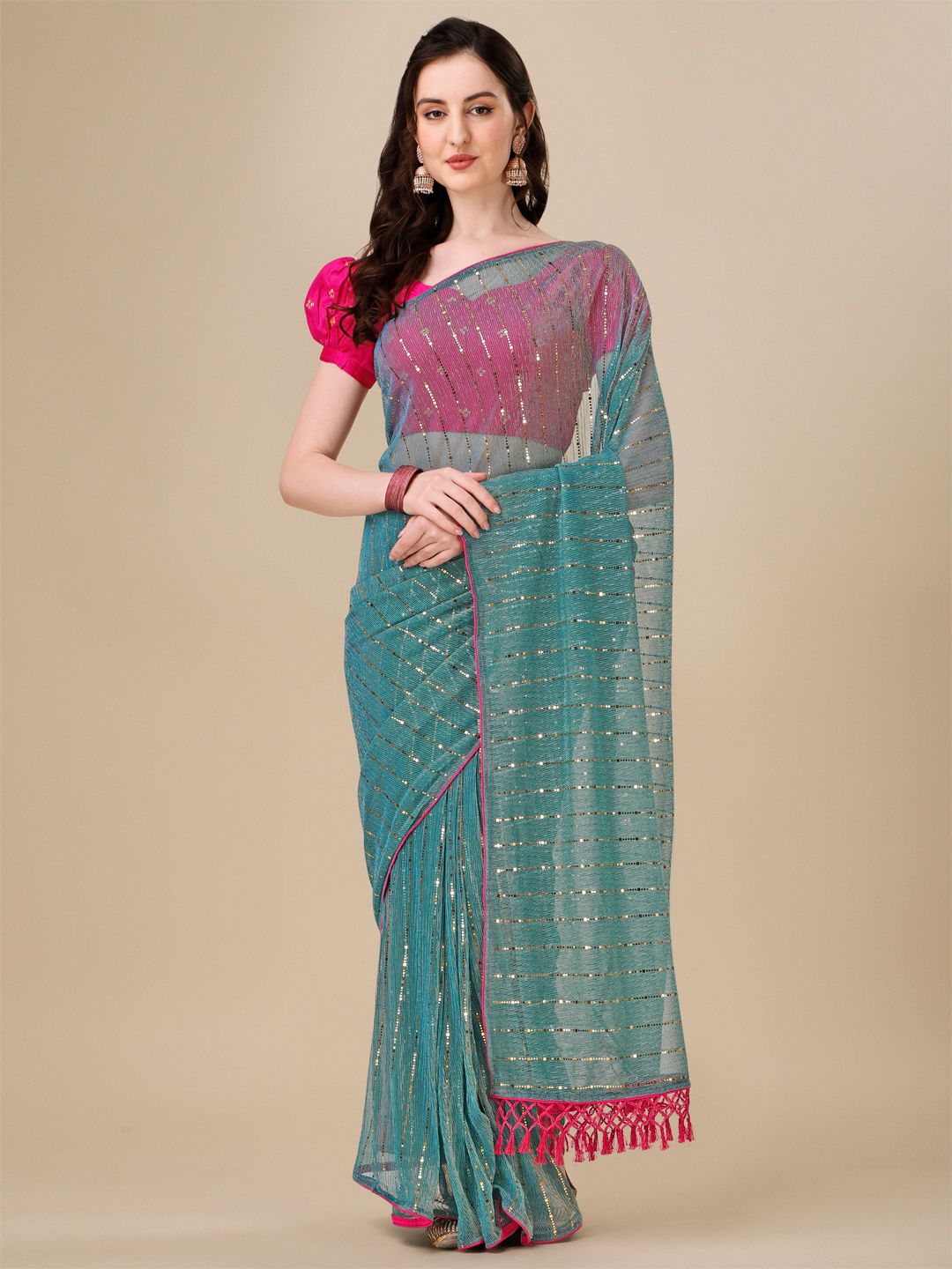 Fancy Embellished Turquoise Coloured Silk Blend Saree with Blouse Piece