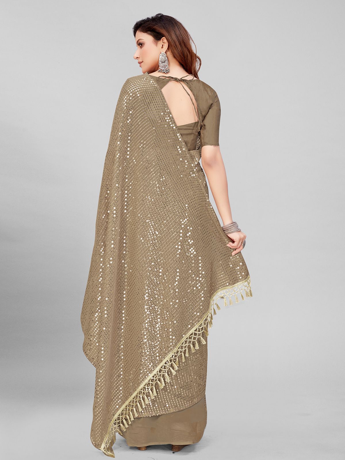 Fancy Sequined Embroidered Beige Coloured Georgette Saree with Blouse Piece